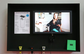photograph of screen playing video of a talking heat and a diagram of the Datacatcher object